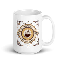 Load image into Gallery viewer, A white 15 oz ceramic coffee mug with a decorative circular logo printed on the side. The logo features a coffee cup illustration and the text 'Chiefy's Cup Coffee Co', 'PREMIUM COFFEE', 'EST 2020.
