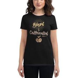 Woman modeling womens fitted black t-shirt with image phrase blessed and caffeinated, with image graphic of words in coffee oriented hues, coffee beans, brown small hearts