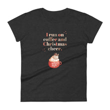 Load image into Gallery viewer, Womens fitted heather dark grey colored t-shirt with image phrase in festive font I run on coffee and Christmas cheer, with image design of festive font words, with a Christmas mug topped with whipped cream and a heart shaped topping
